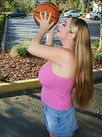 April McKenzie plays basketball outside